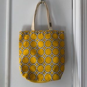 Yellow patterned tote bag with attached coin purse